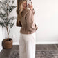 Cinnamon Bun Peplum Knit Sweater